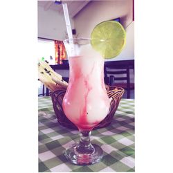 Fruits in glass on table