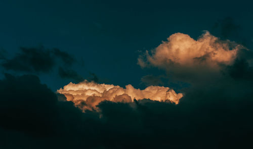 Low angle view of clouds in sky at sunset