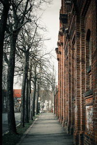 Street amidst buildings against sky