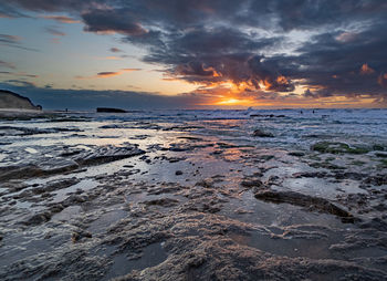 Scenic view of sea against sky during sunset