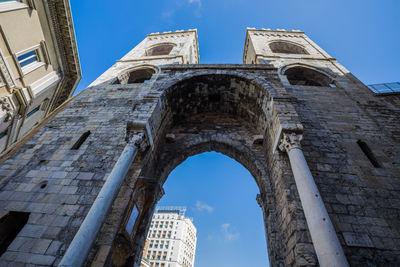 Low angle view of old building against sky