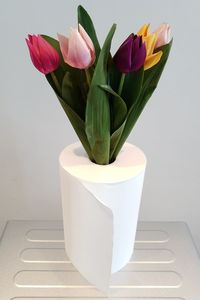 Close-up of white flower vase on table