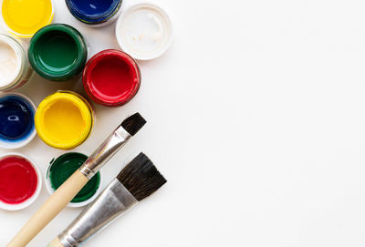 High angle view of paintbrushes on table