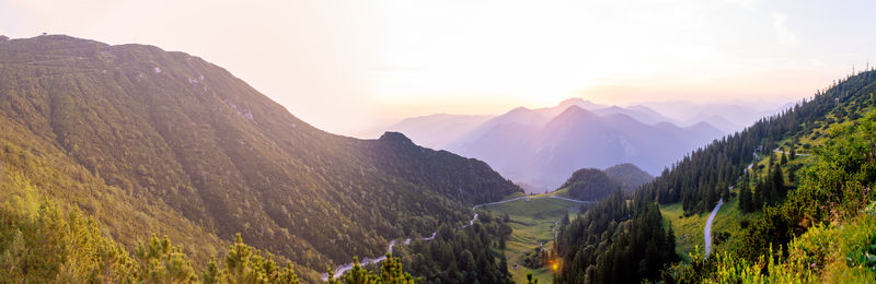 Panoramic view of mountains against sky during sunset