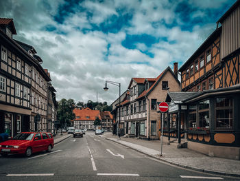Cars on road against sky