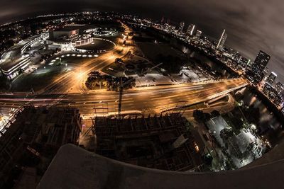 Illuminated cityscape at night