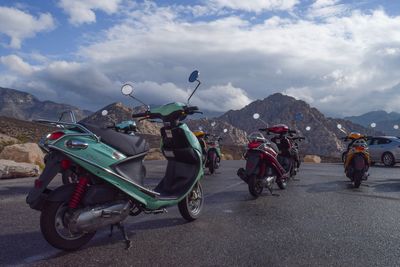 Motorcycle on road against sky