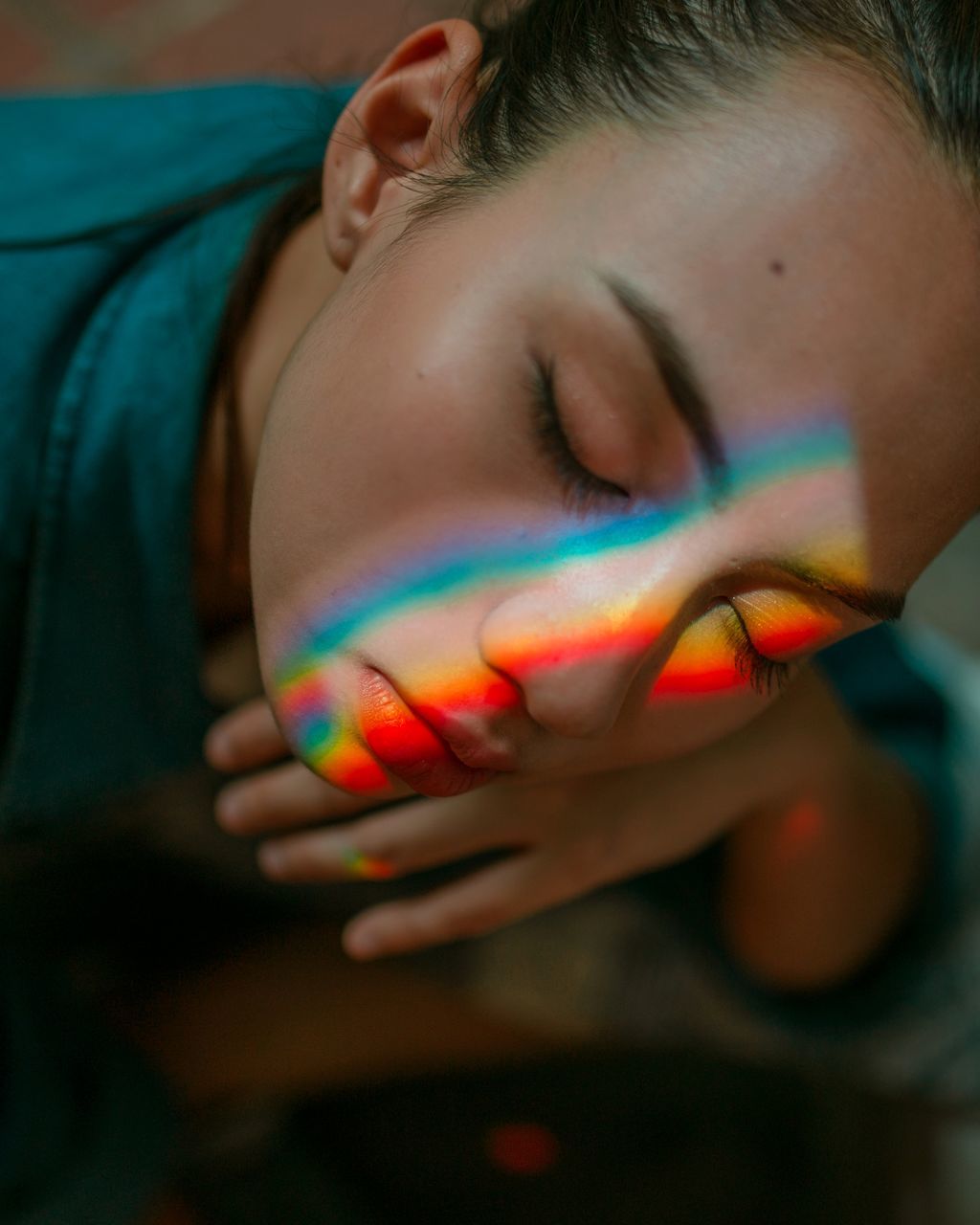 one person, real people, close-up, leisure activity, day, multi colored, headshot, outdoors, bubble wand, young adult