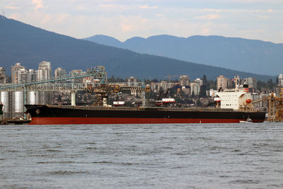 Vancouver ship yard with cargo ship stock image.