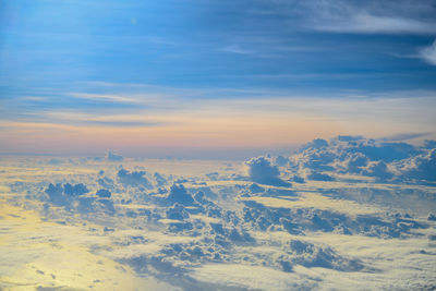 Aerial view of cloudscape against sky during sunset