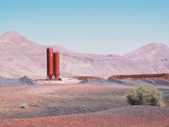 Scenic view of desert against clear sky