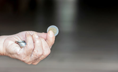 Close-up of hand holding hands