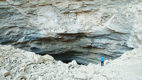 Man standing on rock formation