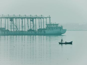 Ship in sea against sky