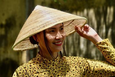 Portrait of woman wearing hat