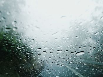 Full frame shot of raindrops on glass