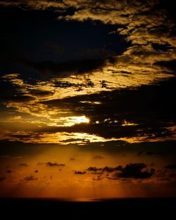 Scenic view of dramatic sky during sunset