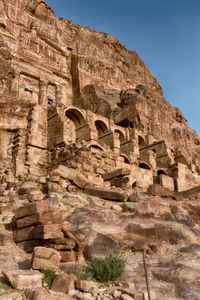 Low angle view of old ruins against clear sky