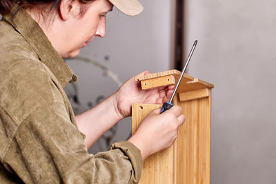 Man working on wood