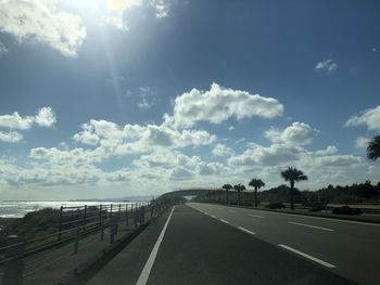 Empty road against sky