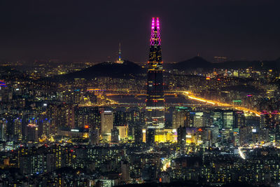 High angle view of illuminated city at night