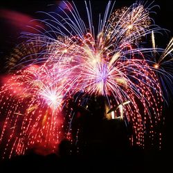 Low angle view of firework display