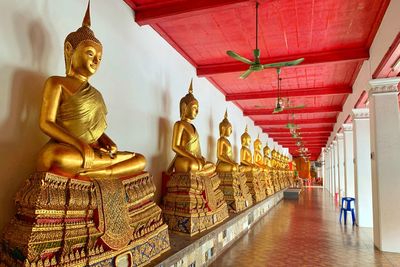 Statue in temple outside building