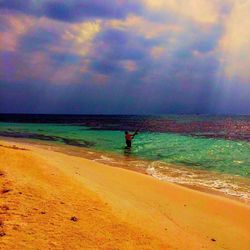 Scenic view of sea at sunset