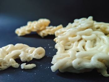 Close-up of chopped vegetables on table