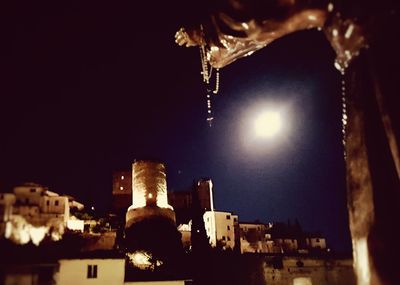 Low angle view of illuminated building at night