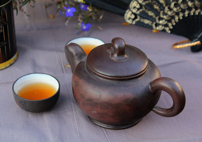 Still life with japanese tea set - tea pot and two little cups