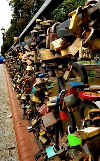 Close-up of padlocks on railing