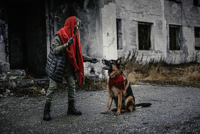 Man with dog on street