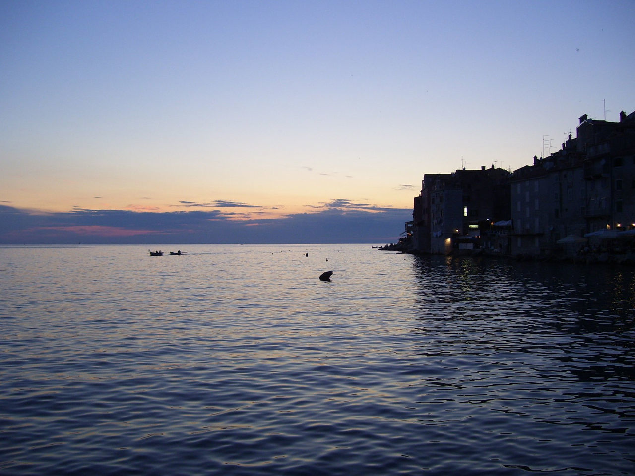 VIEW OF SEA AT SUNSET