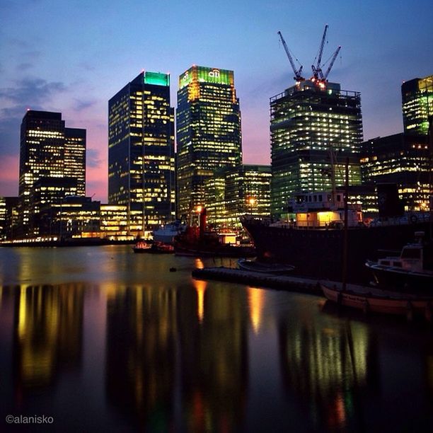 building exterior, architecture, built structure, city, reflection, waterfront, water, illuminated, sky, river, skyscraper, cityscape, dusk, tall - high, building, night, tower, office building, urban skyline, modern