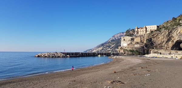 Scenic view of sea against clear sky