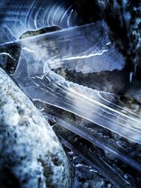 Close-up of icicles on rock