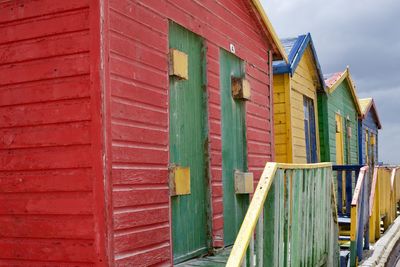 Low angle view of multi colored buildings against sky