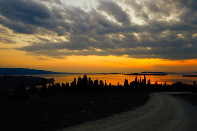 Scenic view of sea against dramatic sky