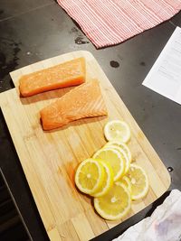 High angle view of bread on cutting board