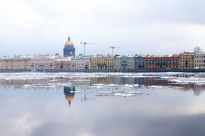 Reflection of building in river