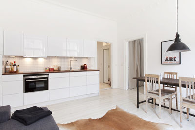 Modern kitchen with dining table