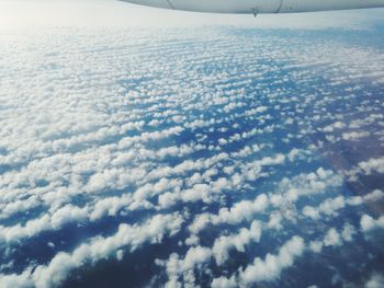 Scenic view of landscape against cloudy sky