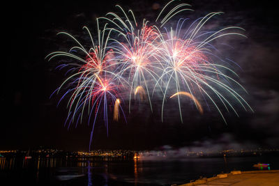 Firework display at night