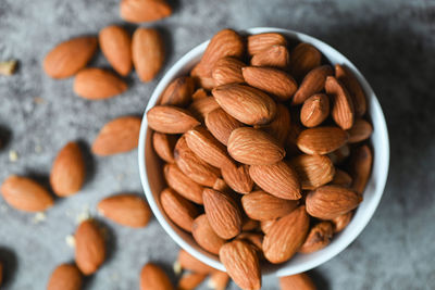 High angle view of almonds in bowl on table