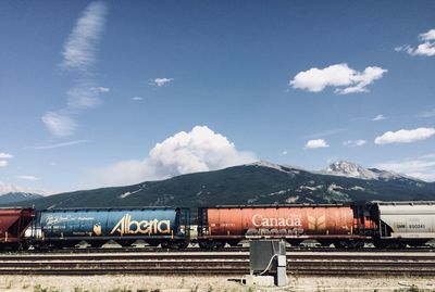 Train on railroad track against sky