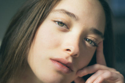 Close-up portrait of young woman