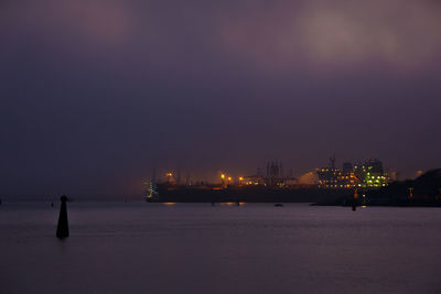 Illuminated harbor at night