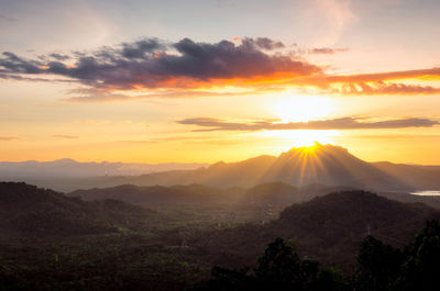 Scenic view of mountains against sky during sunset