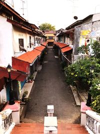 Alley amidst buildings in city
